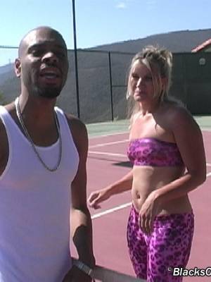Horny flat chested blonde takes a mouthful of ebony cum in public