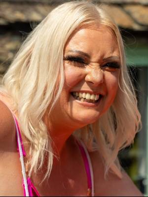 Middle-aged blonde woman displays her massive ass after washing her car Porn Pics english 07