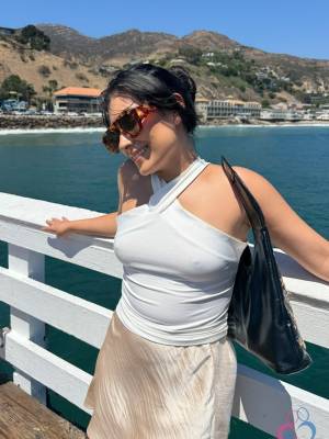 Amateur chick with a bushy muff shows her beaver on a boat in sunglasses Porn Pics english 20