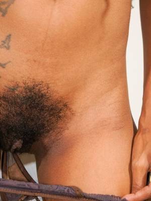 Amateur chick with long hair touches her full bush on a sofa Porn Pics english 11
