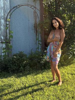 Busty amateur exposes her natural tits while posing outdoors Porn Pics english 04