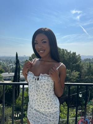 Pretty black girl takes a day trip with her feet and pussy bare