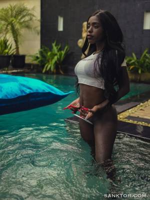 Sexy girl Little Miss Mia Sanktor hits upon hot solo poses at an exotic locale Porn Pics english 13