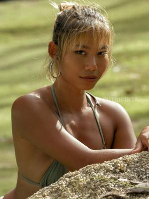 Sexy Asian babe Isobel poses in a bikini and while totally naked outdoors Porn Pics english 17