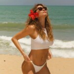 Luciana Gimenez showing her breasts naked in transparent clothing
