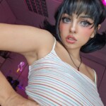 Adorable teen Nerdy B frees her tits and phat ass as well in her bedroom